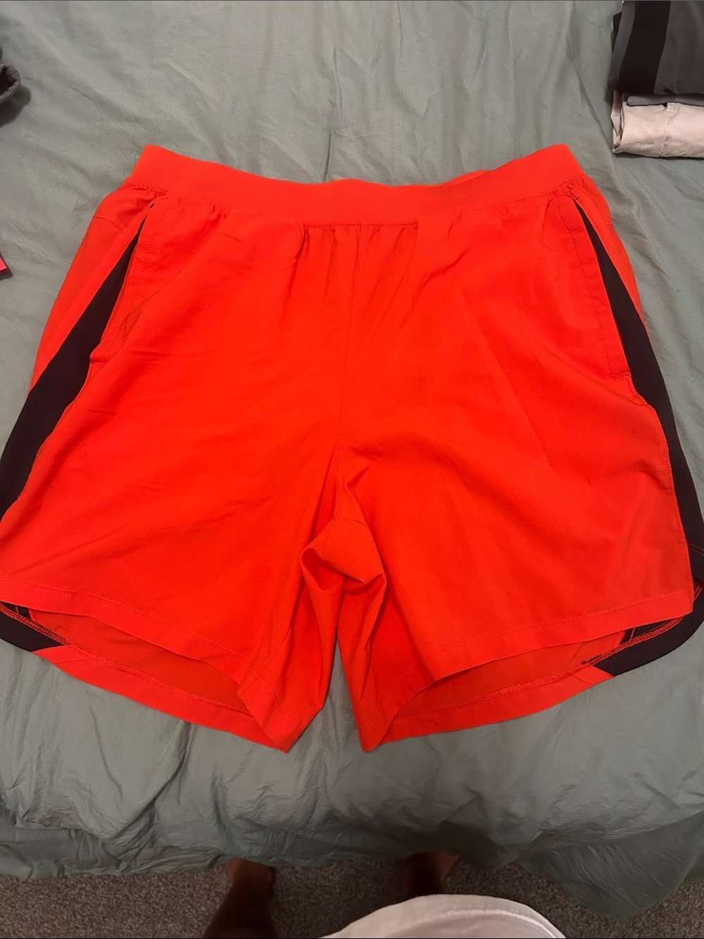 Under Armour Men's Neon Orange Athletic Shorts with Black Panels